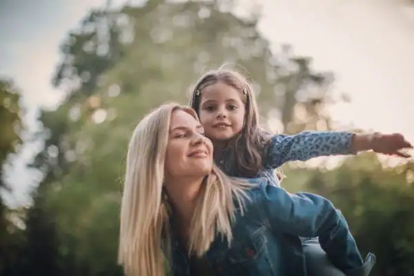 happy mum and daughter following mediation to resolve parental alienation Salford